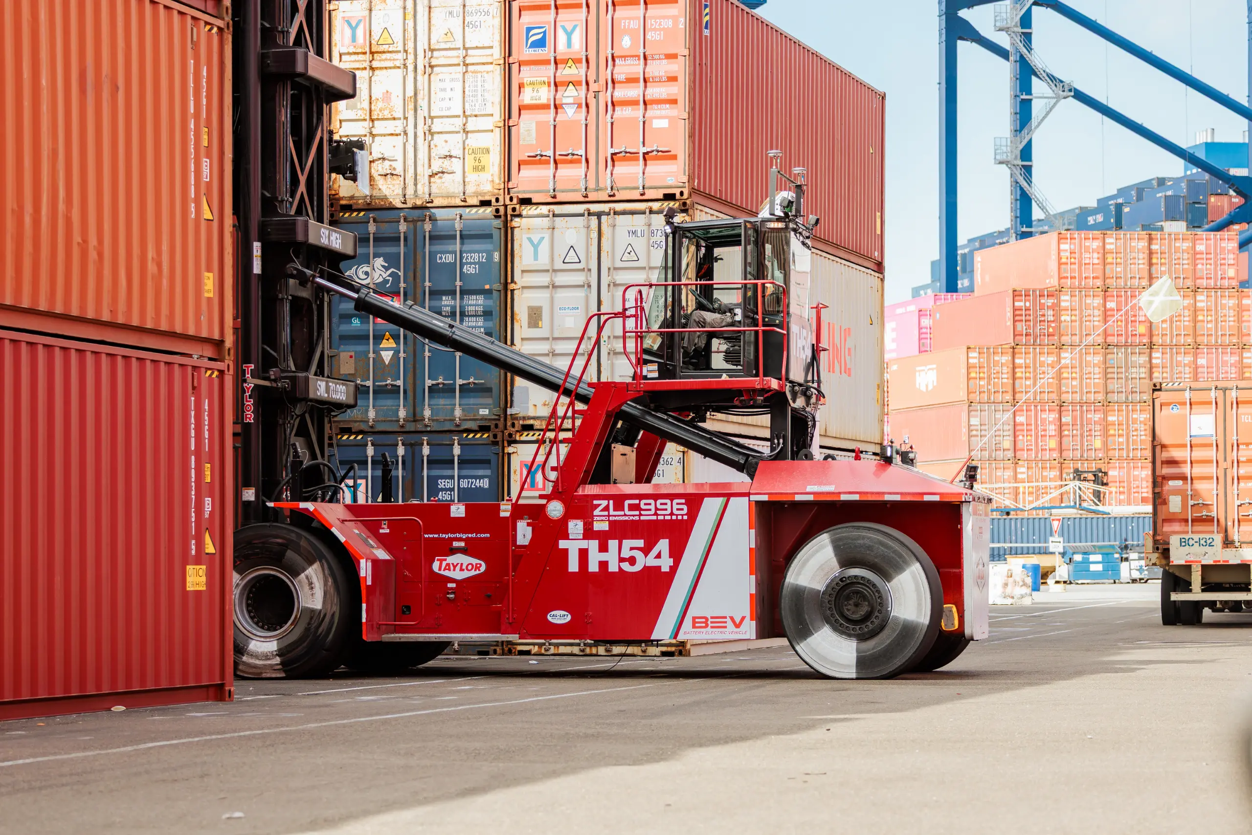 Taylor empty container handler moving empties for repositioning