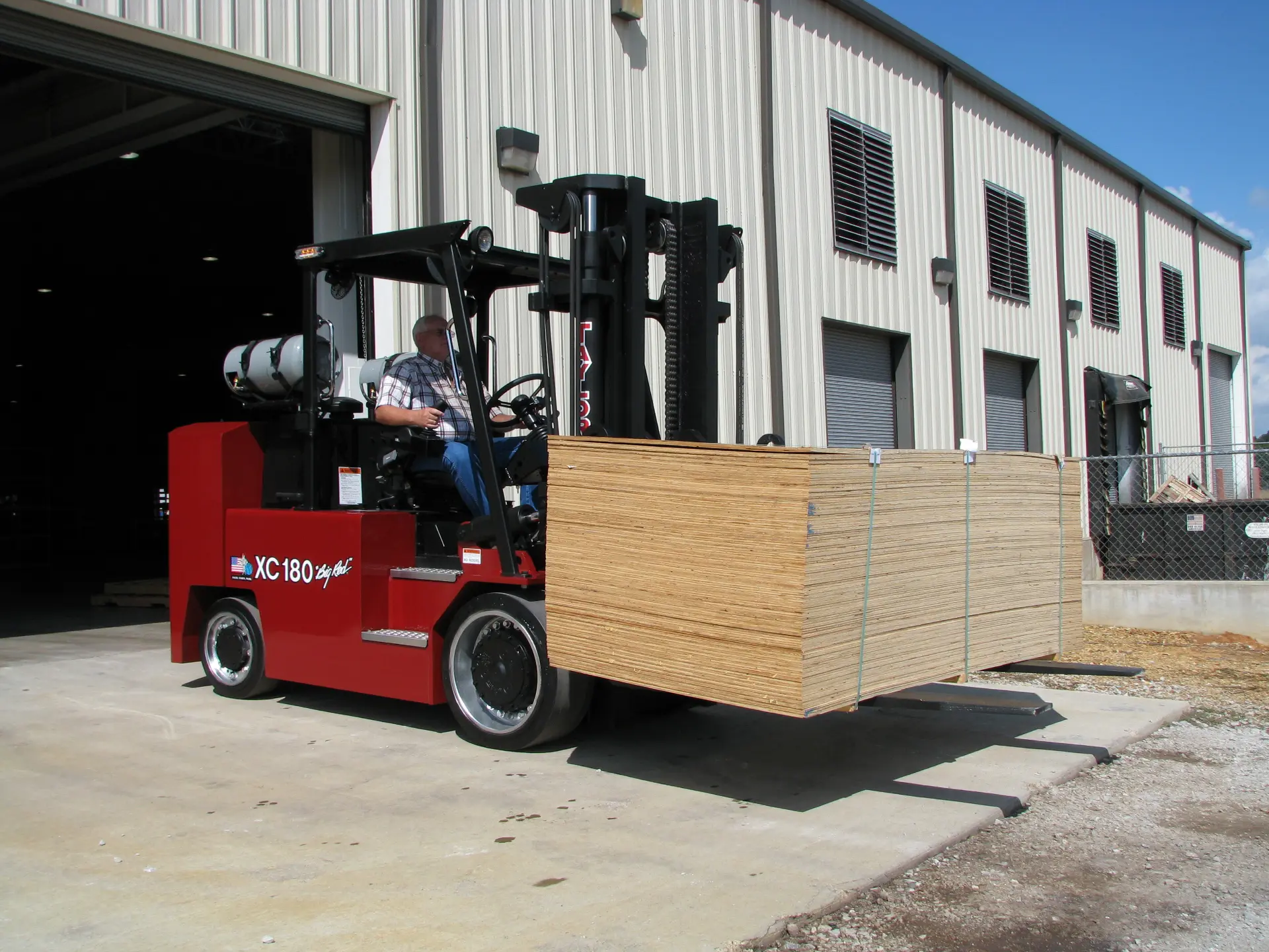 Taylor cushion tire forklift staging drywall indoors