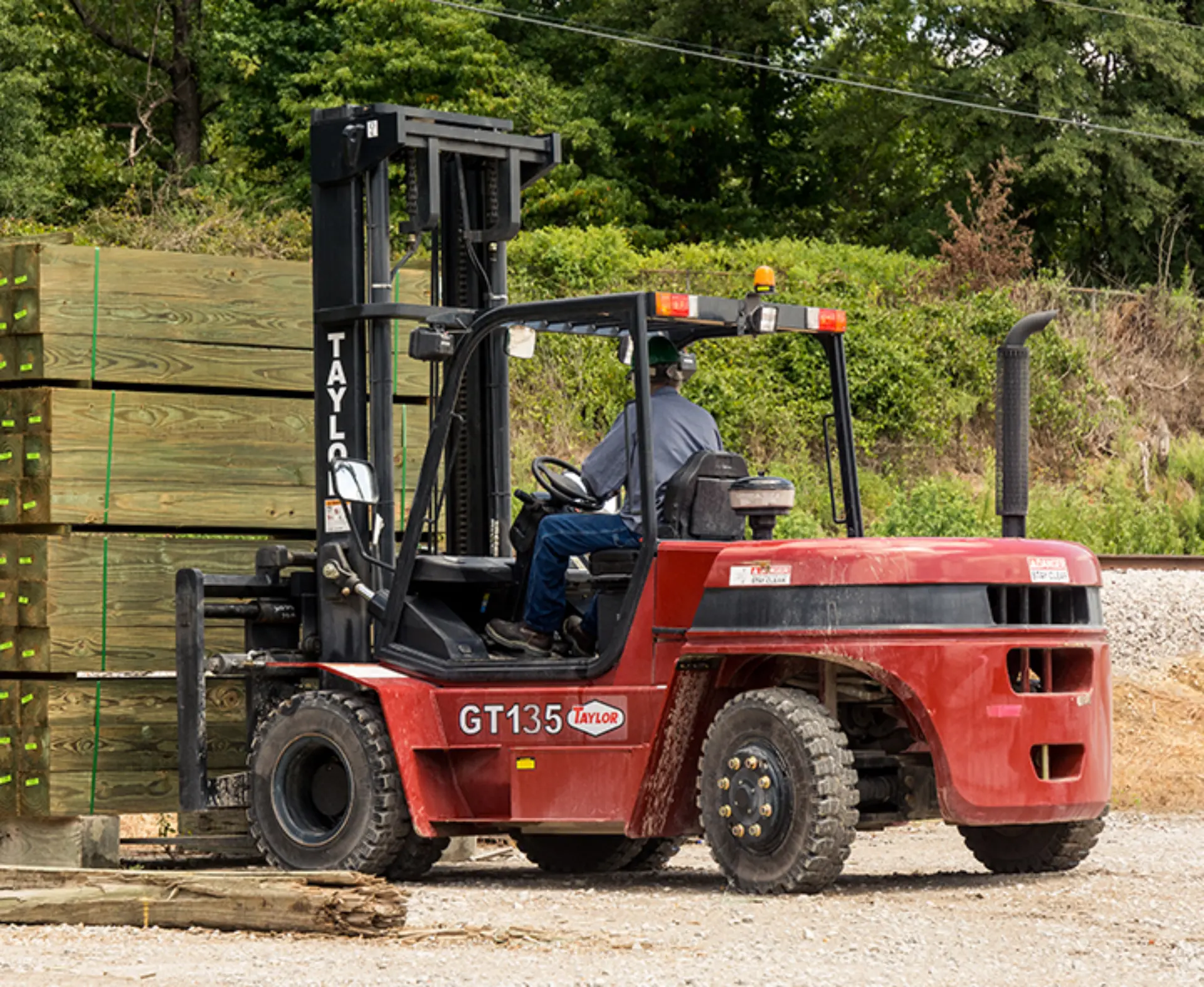 Taylor pneumatic tire forklift moving palletized building products