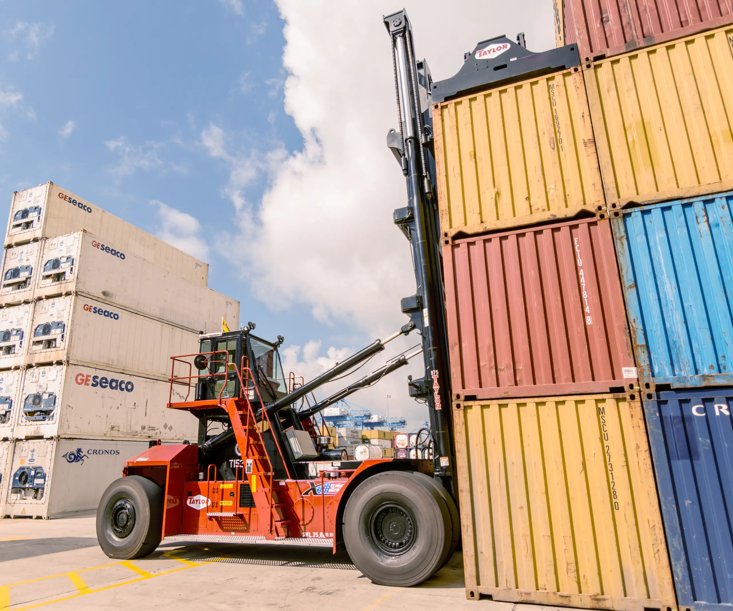 Taylor loaded container handler stacking full containers
