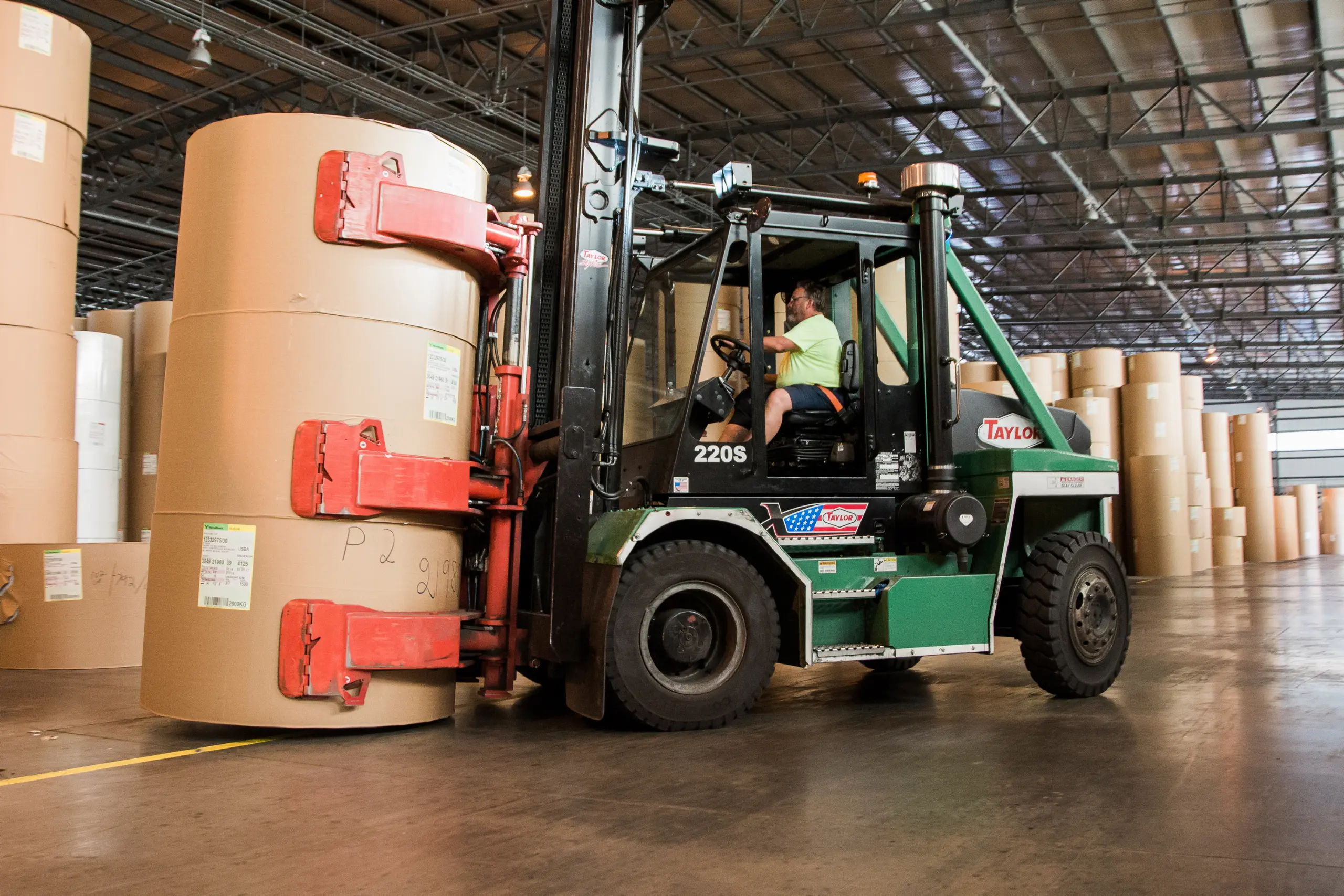 Taylor pneumatic forklift staging pulp bales outdoors