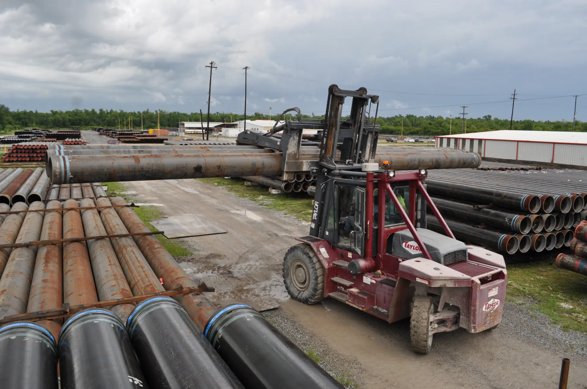 Taylor big wheel forklift with pipe clamp