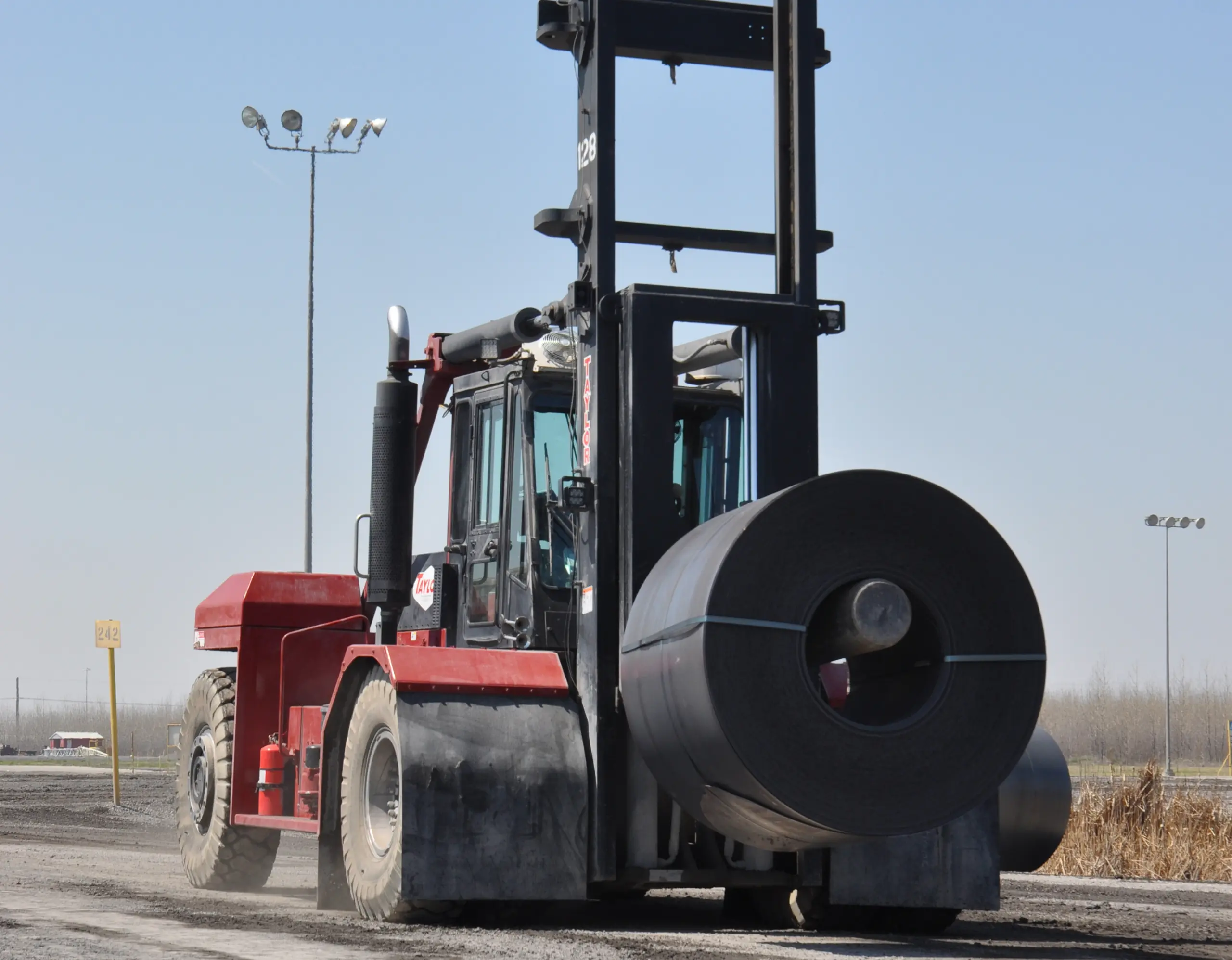 Taylor heavy-duty forklift equipped with a coil ram for steel handling